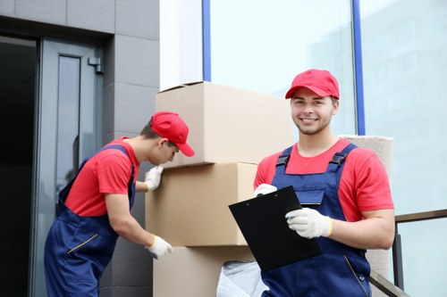 Office relocation planning in Belsize Park with boxes and workstations