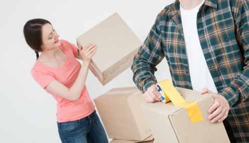 Student removals team preparing boxes for a move in Belsize Park