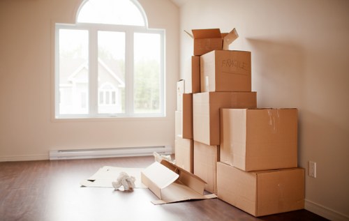 Packed office equipment ready for relocation in Belsize Park