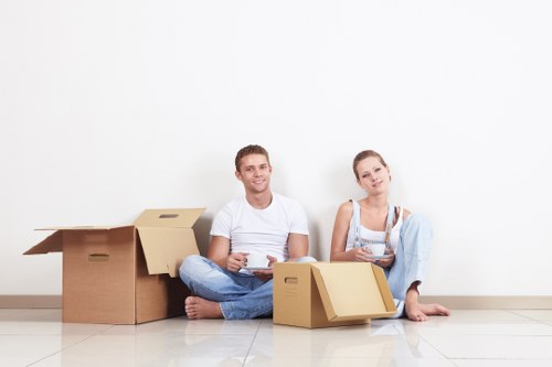 Local moving team handling fragile items in Belsize Park