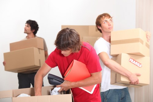 Furniture and boxes being loaded for a North West London flat move