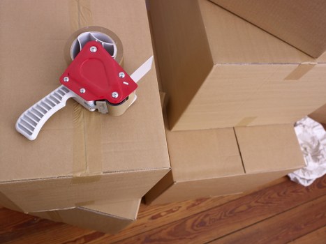 Team handling office equipment during a Belsize Park move