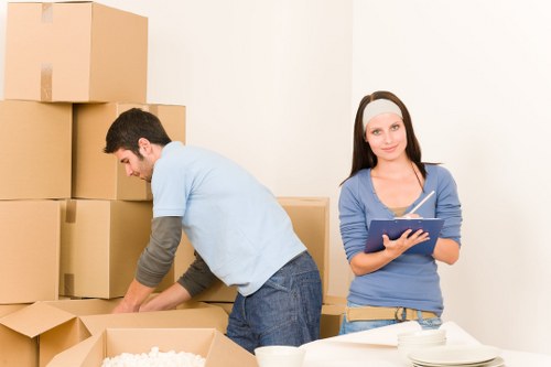 Packed boxes and furniture prepared for a residential removal in Belsize Park