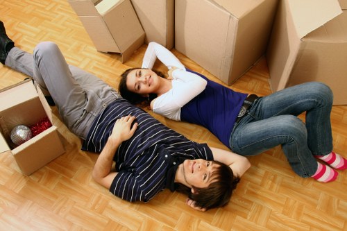 Packed boxes and furniture ready for transport in a local removal service