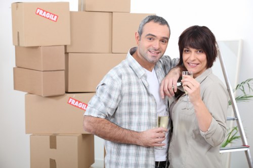 Packed boxes and furniture ready for collection from a Belsize Park home
